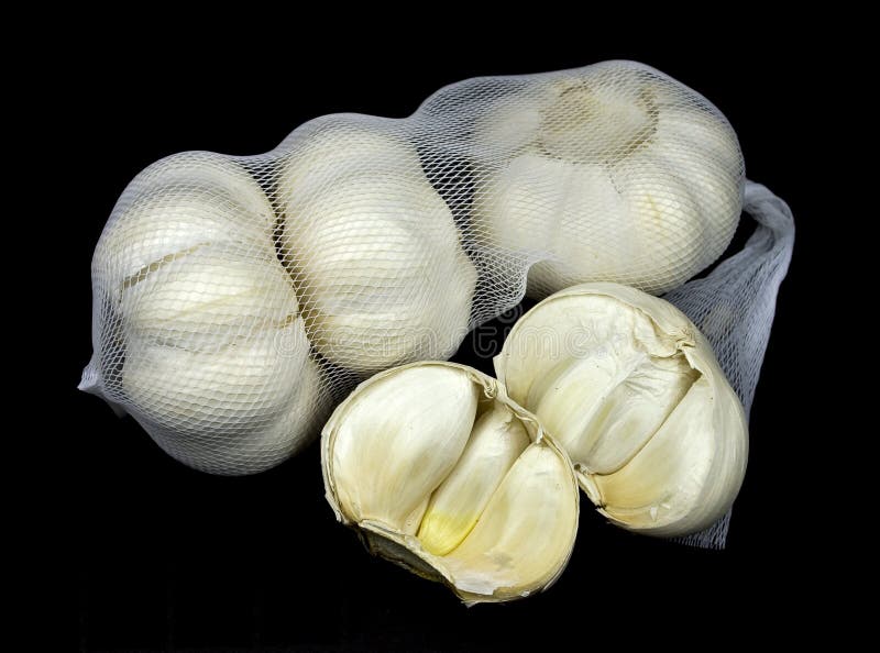Garlic Head and Cloves on a Black Background Stock Photo Image of