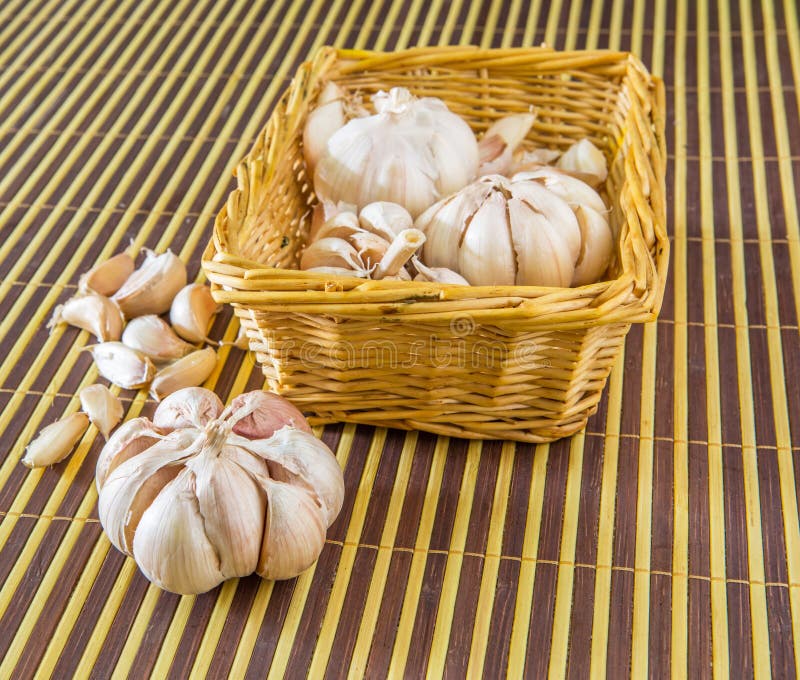 Garlic on a bamboo mat. Garlic on a bamboo mat