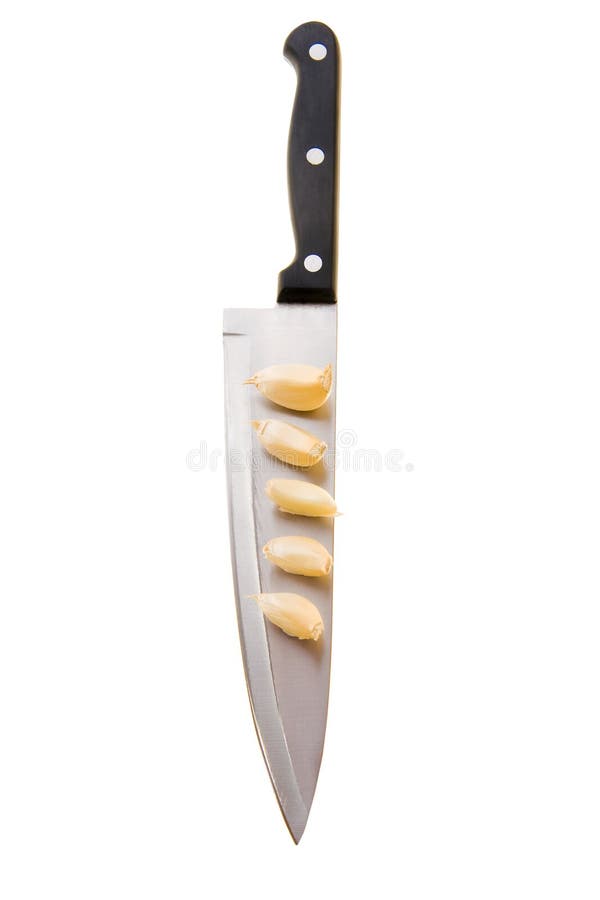 Garlic on knife stock image. Image of flavouring, crop 13255393