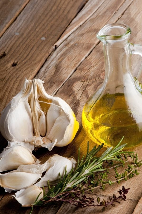 Olive Oil with Thyme and Salt Flower on Wooden Background Stock Image