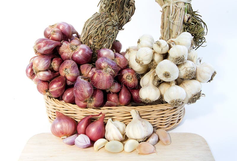 Garlic and Onion in Basket on White Background. Stock Photo Image of