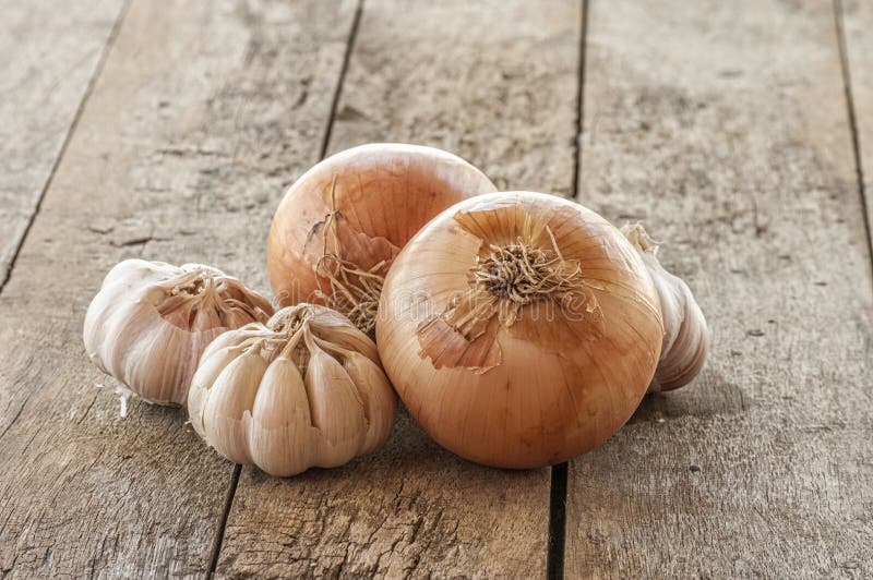 Garlic and onion on cutting board