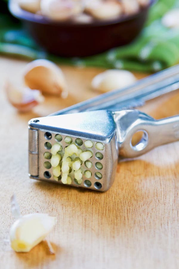 Garlic press stock image. Image of kitchen, pushing, cooking 35192845