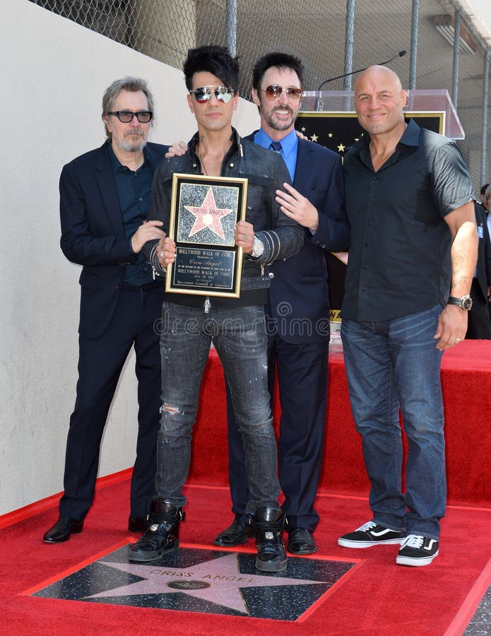 LOS ANGELES, CA - July 20, 2017: Gary Oldman, Criss Angel, Lance Burton, Randy Couture at the Hollywood Walk of Fame Star Ceremony honoring illusionist Criss Angel. LOS ANGELES, CA - July 20, 2017: Gary Oldman, Criss Angel, Lance Burton, Randy Couture at the Hollywood Walk of Fame Star Ceremony honoring illusionist Criss Angel