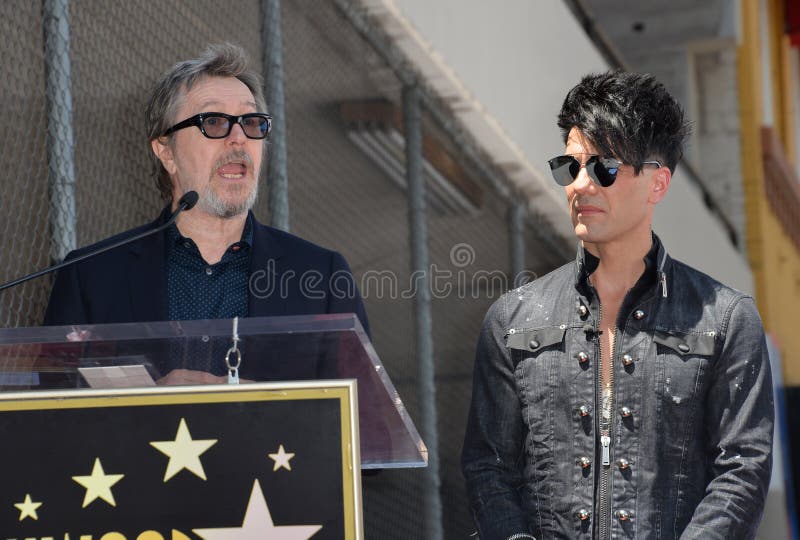 LOS ANGELES, CA - July 20, 2017: Gary Oldman & Criss Angel at the Hollywood Walk of Fame Star Ceremony honoring illusionist Criss Angel. LOS ANGELES, CA - July 20, 2017: Gary Oldman & Criss Angel at the Hollywood Walk of Fame Star Ceremony honoring illusionist Criss Angel