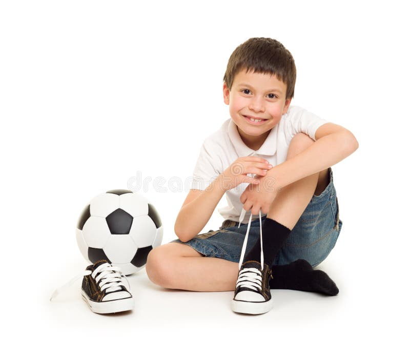 Garçon avec du ballon de football photo libre de droits Garçon avec du ballon de football photo libre de droits