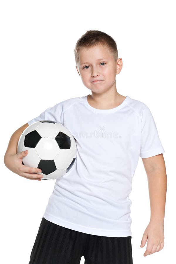 Garçon sûr avec du ballon de football photos stock Garçon sûr avec du ballon de football photos stock