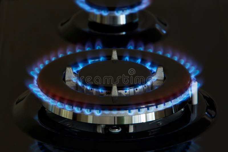 Gas burners lit stock photo. Image of heat, power, fossil 81093318