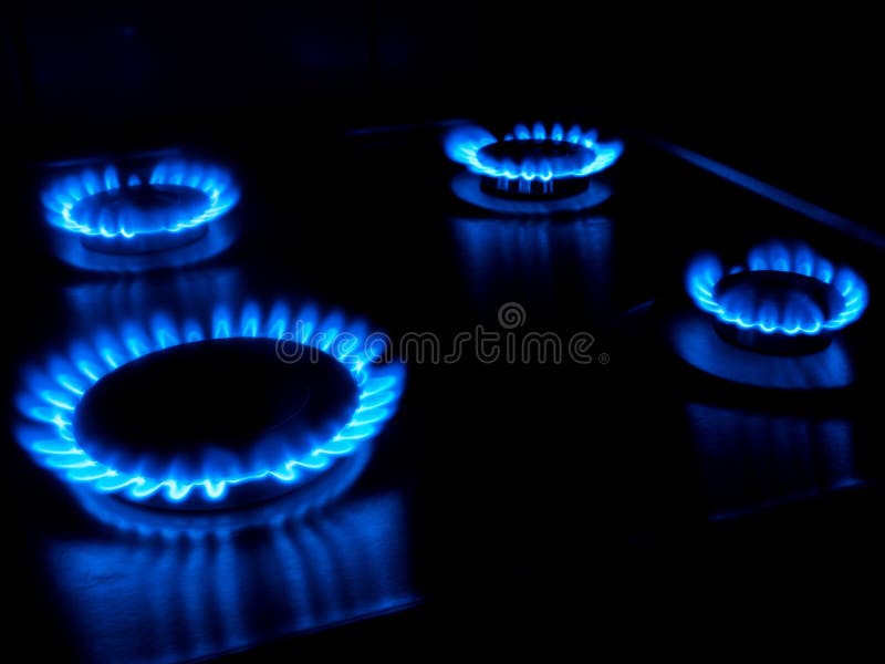 Gas burning from a kitchen gas stove stock photos