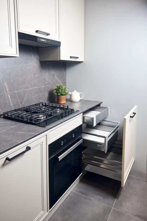 Gas Cooker Black Glass and Iron Hob and Hood on Marble Light Stoneware ...