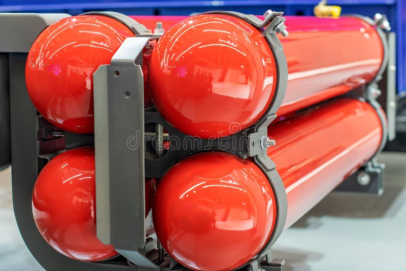 Gas Equipment for Propane Red Gas Cylinders on a Car Stock Image