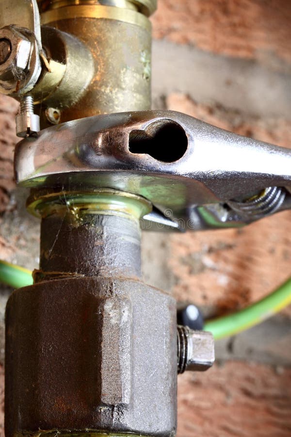 Gas pipe man connecting stock image. Image of valve, leak - 65539307