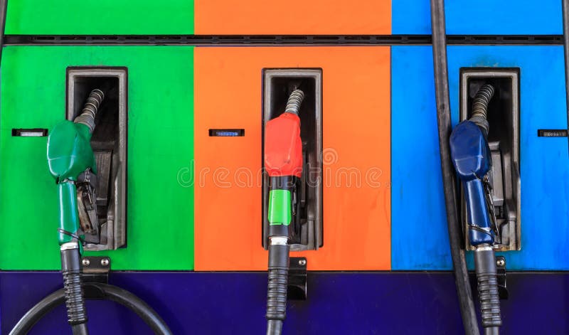 Gas pump nozzles in a service station.