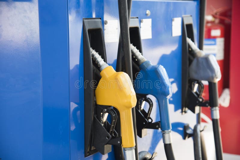Gas station. Fuel pump.Colorful petrol pump filling nozzles head