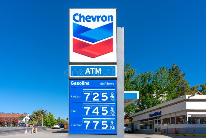 Gas station price sign. Chevron gas station is selling regular gasoline for over seven dollars a gallon