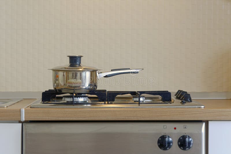 Gas stove and pot stock image. Image of recipe, indoor 81196409