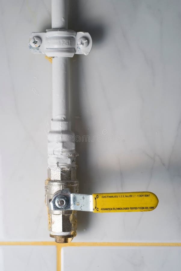 Gas Isolating Valve on Pipe in House. the Yellow Handle Lever Ball