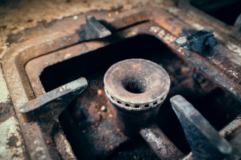 Gasbrander van een zeer oude gaskachel stock foto's