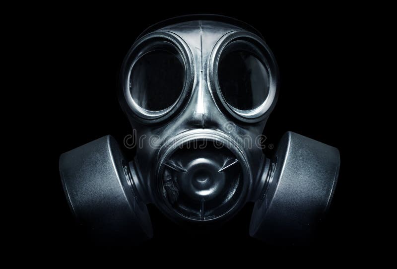 A black military gas mask for protection. A black military gas mask for protection