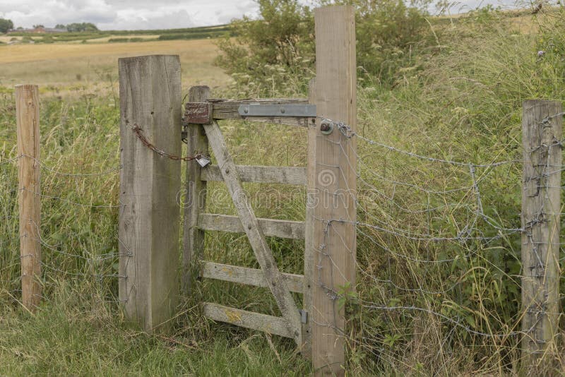 Gate Locked with a Padlock Leading into a Field Stock Photo Image of
