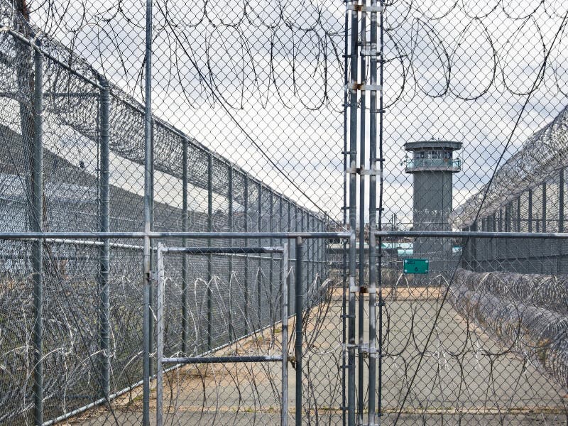 Il filo spinato e la torre di guardia, vecchia Nevada Prigione di Stato a Carson City, Nevada.