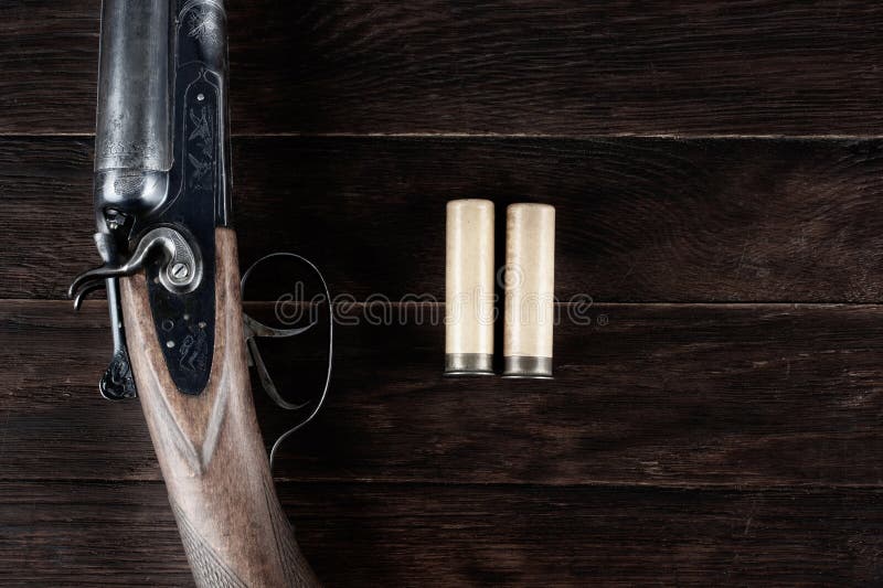 12 gauge break action smooth bored shotgun with paper cartridges vector illustration