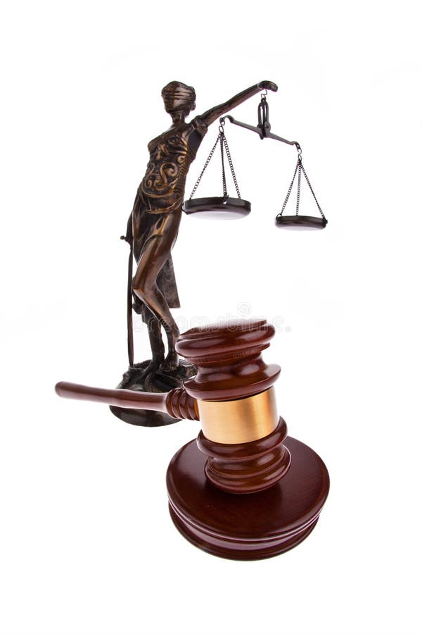 A judge's hammer with Justitia figure. Isolated against a white background. A judge's hammer with Justitia figure. Isolated against a white background.