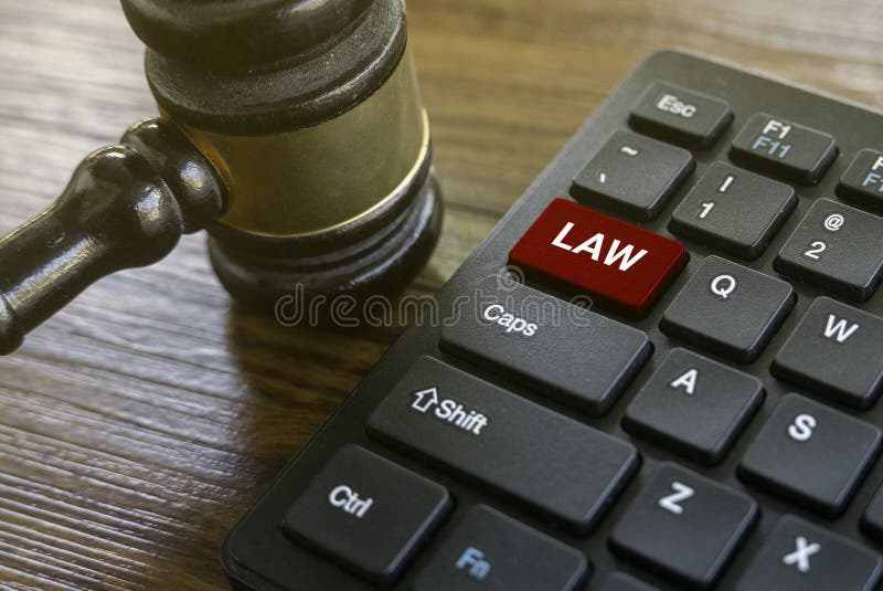 Gavel and Keyboard with Law Key - Legal Technology Concept royalty free stock photography