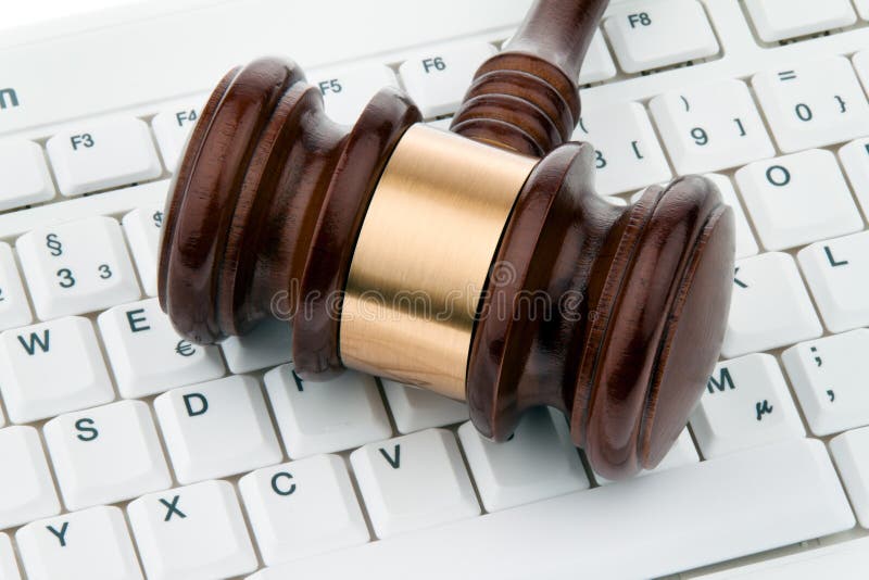 Gavel and keyboard.Legal certainty on the Internet