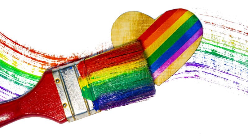 Gay love. Wooden heart with satin ribbons in LGBT colors and a brush on a rainbow background. Pride tape Symbol. Isolated on white background. Love, human rights, tolerance. Valentin`s Day.