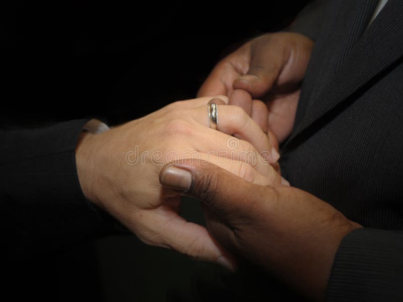 Image of two men Holding hands at gay Wedding. Image of two men Holding hands at gay Wedding