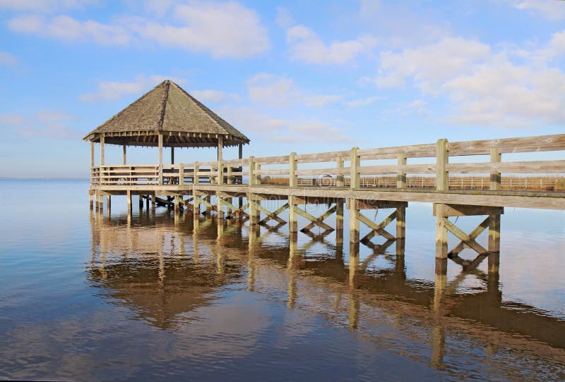 Gazebo, dock, blue sky and clouds royalty free stock image Gazebo, dock, blue sky and clouds royalty free stock image