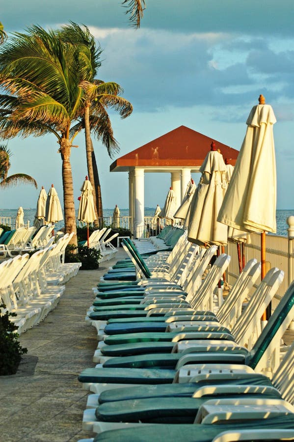 Gazebo, green chair, palms in cancun