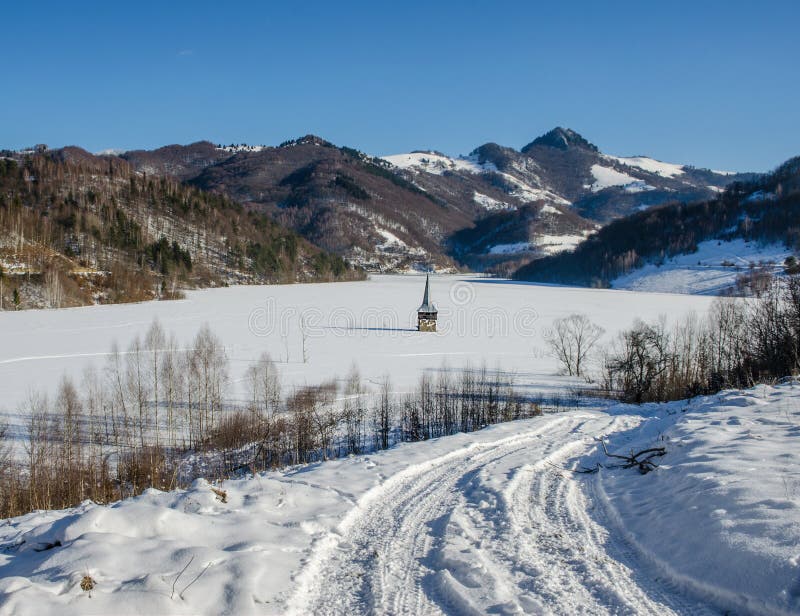 Geamana, an abandoned village flooded with waste water from mining. Nature pollution from copper mine in Transylvania, Romania