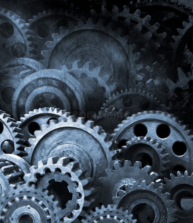 A retro black and white background of industrial cogs or gears with movement. A retro black and white background of industrial cogs or gears with movement