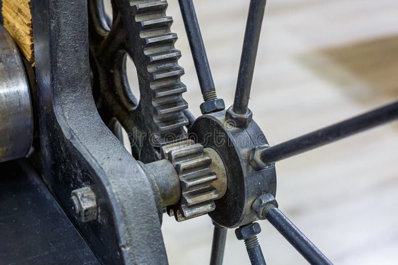 Gears mechanism. details of old ancient machine for making engravings stock images