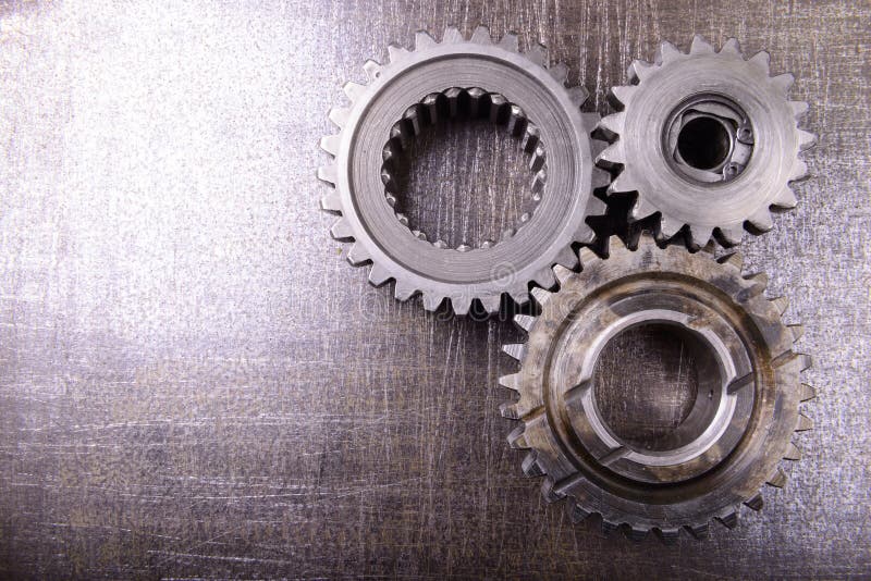 Gears on metal background