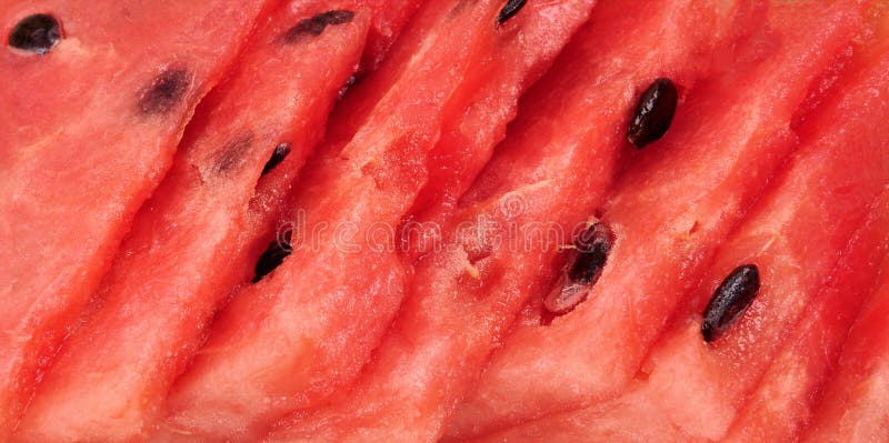 Gebarsten Gesneden stukken van de rode achtergrond van de watermeloentextuur Sluit omhoog royalty-vrije stock foto's Gebarsten Gesneden stukken van de rode achtergrond van de watermeloentextuur Sluit omhoog royalty-vrije stock foto's