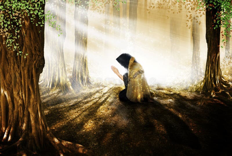 A figure kneeling in the woods praying into a heavenly light. Concept for God is everywhere. A figure kneeling in the woods praying into a heavenly light. Concept for God is everywhere.