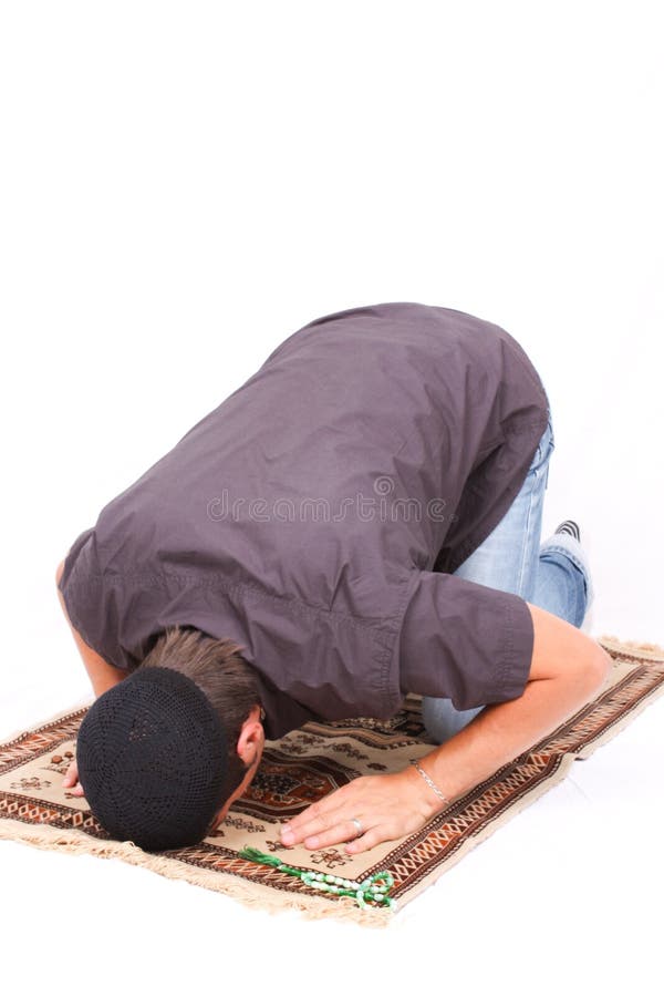 Muslim praying putting head on the floor. Muslim praying putting head on the floor