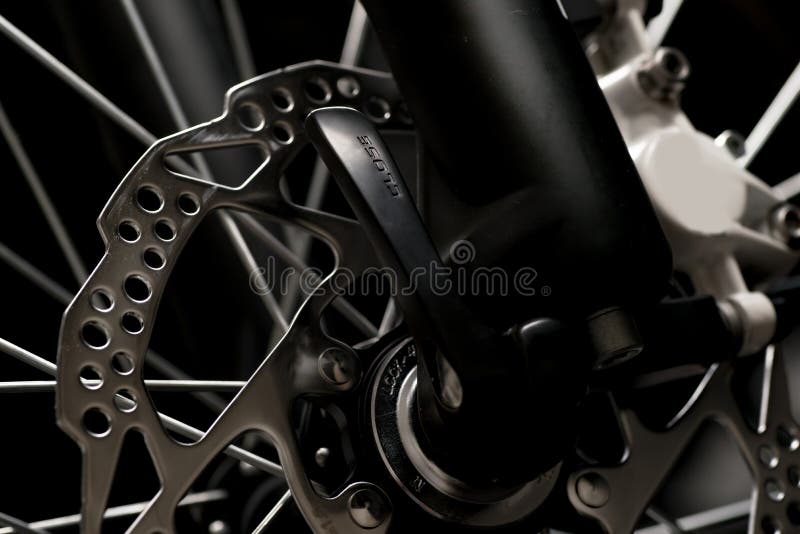 Gebirgsfahrradphotographie im Studio, Fahrradrad mit Scheibenbremsen, Fahrradteil, rund stockfotografie Gebirgsfahrradphotographie im Studio, Fahrradrad mit Scheibenbremsen, Fahrradteil, rund stockfotografie