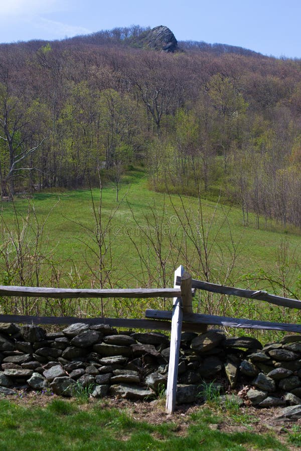 Augusta County - May 7th: view of Humpback Rocks with a fence in the forground on the Blue Ridge Parkway in Augusta County, Virginia on May 7, 2014. Augusta County - May 7th: view of Humpback Rocks with a fence in the forground on the Blue Ridge Parkway in Augusta County, Virginia on May 7, 2014.