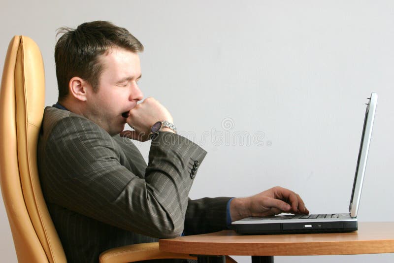 Gebohrter, gähnender Geschäftsmann stockfotos Gebohrter, gähnender Geschäftsmann stockfotos