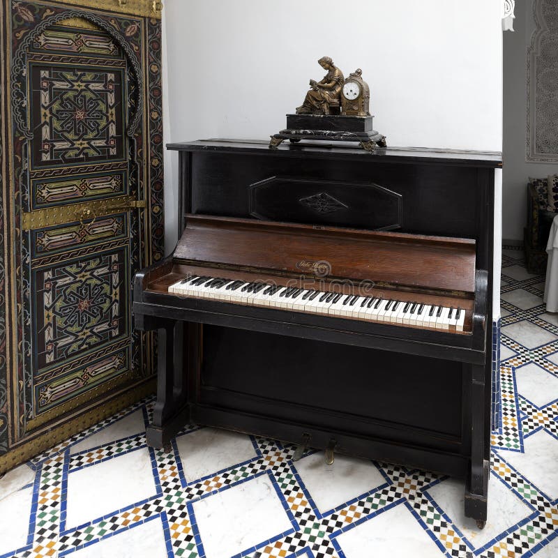 Pictured is a Gebr. Glaser Jena piano at the Riad Maison Bleue, a luxury boutique hotel in Fes, Morocco. The piano brand Gebr. Glaser was produced at a factory in Jena, Germany, from 1915 until the factory closed in 1940.  The Riad Maison Bleue was created in a house dating from the 19th century whose former owner, was the late Moulay Bel Arbi El Alaoui, famous judge and professor of theology. Today the luxury boutique hotel it is managed by the El Abbadi`s family. Pictured is a Gebr. Glaser Jena piano at the Riad Maison Bleue, a luxury boutique hotel in Fes, Morocco. The piano brand Gebr. Glaser was produced at a factory in Jena, Germany, from 1915 until the factory closed in 1940.  The Riad Maison Bleue was created in a house dating from the 19th century whose former owner, was the late Moulay Bel Arbi El Alaoui, famous judge and professor of theology. Today the luxury boutique hotel it is managed by the El Abbadi`s family.