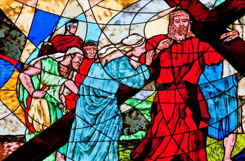 Gebrandschilderd glas die Jesus tonen die het kruis dragen royalty-vrije stock afbeelding Gebrandschilderd glas die Jesus tonen die het kruis dragen royalty-vrije stock afbeelding