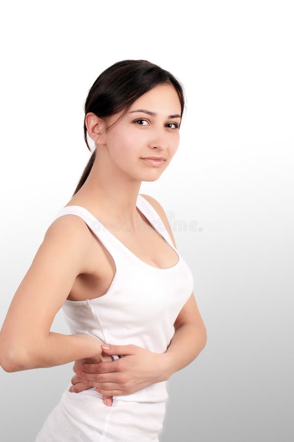 Back Pain. Beautiful Young Woman Feeling Strong Spinal Pain, Having Health Issue. Attractive Girl Suffering From Painful Feeling, Backache, Holding Hands On Body. Health Care Concept. High Resolution. Back Pain. Beautiful Young Woman Feeling Strong Spinal Pain, Having Health Issue. Attractive Girl Suffering From Painful Feeling, Backache, Holding Hands On Body. Health Care Concept. High Resolution.