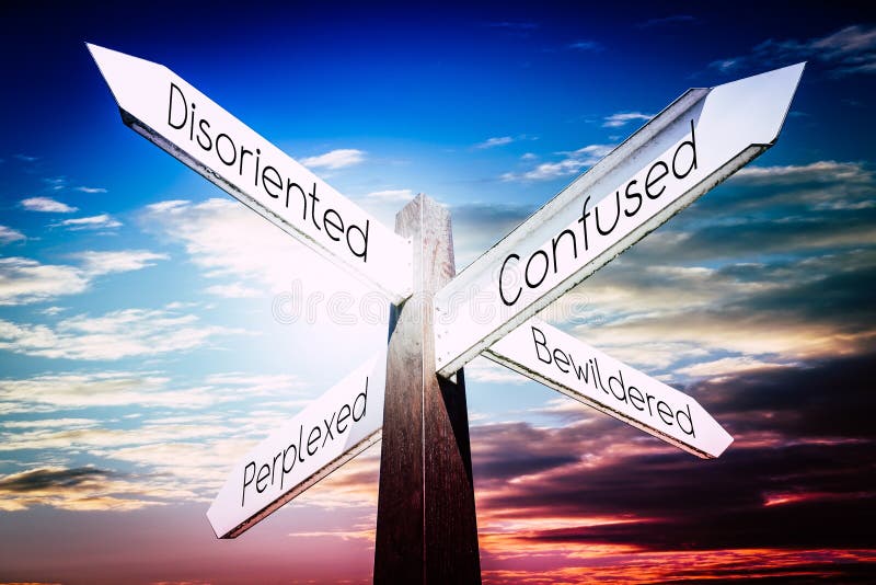 Disoriented, confused, perplexed, bewildered concept - signpost with four arrows, sky in background. Disoriented, confused, perplexed, bewildered concept - signpost with four arrows, sky in background.