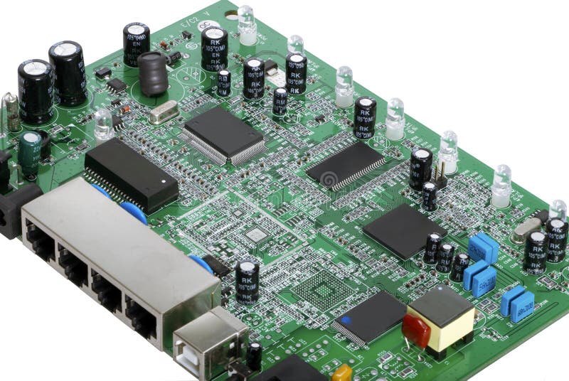 Close up view of a modern printed circuit board showing various electronic components and connectors. Close up view of a modern printed circuit board showing various electronic components and connectors