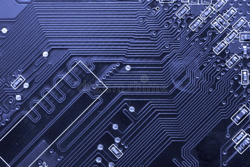 Macro shot of a printed circuit board with details of connection and chip. Macro shot of a printed circuit board with details of connection and chip