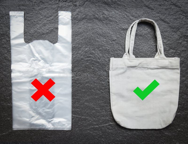 Geen plastic zak/de zakdoek die van de canvasstof van de Gebruikstotalisator vervangt zegt nr aan plastic zakken winkelen stock foto's Geen plastic zak/de zakdoek die van de canvasstof van de Gebruikstotalisator vervangt zegt nr aan plastic zakken winkelen stock foto's